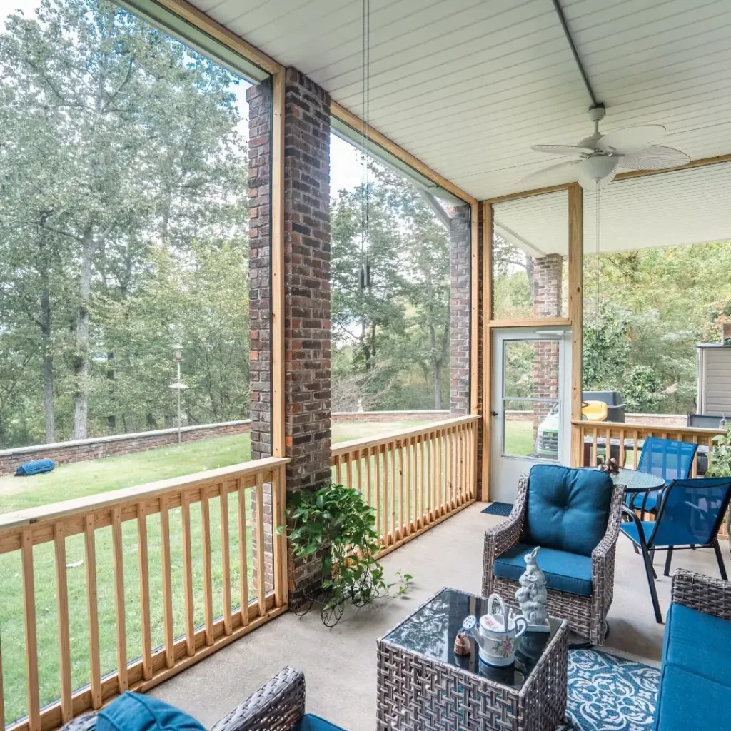 Cozy enclosed patio with greenery view